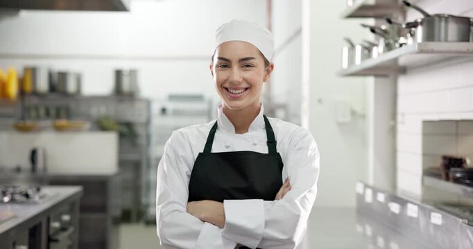 Face, confident chef and happy woman in kitchen for catering, gastronomy and pride in restaurant. Portrait, smile and culinary artist with arms crossed, professional cook and hospitality in Italy