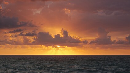 Fototapeta premium Dramatic weather change with sunset in Emdens North Sea, natural phenomena