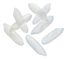 Translucent, oblong rice grains with pointed ends.