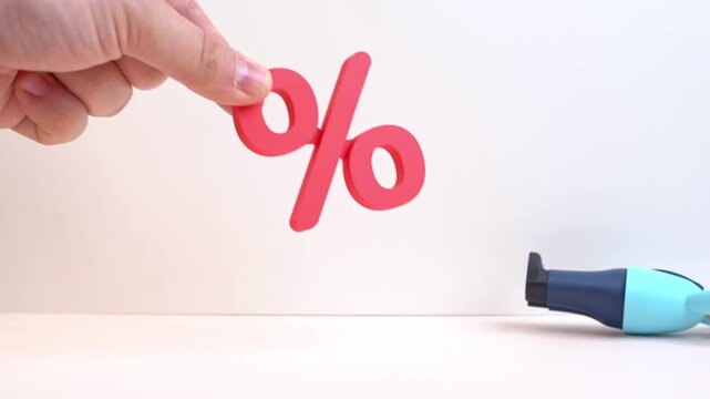 The businessman is shocked by the high interest rates. High tax deductions. Economic downturns, banking policy, taxation, and monetary regulation topics. Financial stress and rising borrowing costs