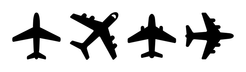 Obraz premium Silhouette illustration of four airplanes viewed from above in a row on a white background
