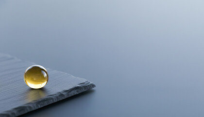 Drop of sunflower oil hyperrealism blue-gray background minimalism purity label