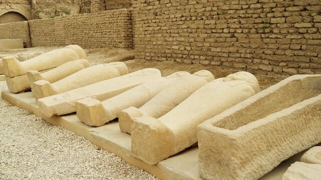 Stone ancient Egyptian sarcophagi on the territory of the temple of Dendera Egypt. A historical example of an ancient burial site during the time of the pharaohs.