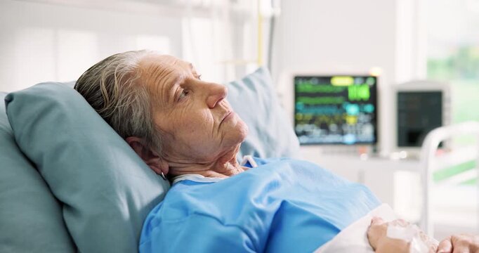 Sick, senior woman and thinking in hospital bed for recovery, medical service or post surgery. Healthcare, ill elderly patient or reflection at inpatient ward for rehabilitation or remember operation