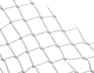 Close-up of a white, interconnected netting against a black background