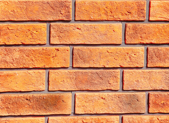 Obraz premium Orange Brick Wall Texture with Rectangular Pattern for Modern Architectural and Construction Design Copy Space Background