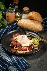 Fried egg and sliced sausage.