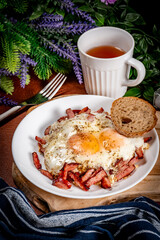 Fried egg and sliced sausage.