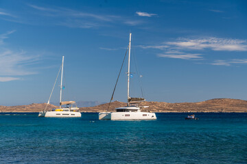 Fototapeta premium Sailboats Anchored in Turquoise Waters of the Aegean Sea, Greece