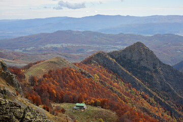 Autumn mountain landscape near the Paradise Splashes waterfall and the Paradise hut in the Central Balkans Bulgaria Landscape cliffs rocks walks tourism forest flora nature panorama