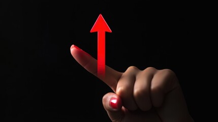 Female finger pointing up with red arrow symbol on black background