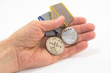 Medals on the palm