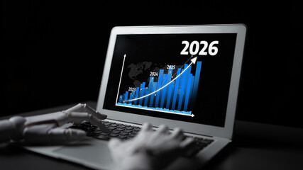 A robotic hand interacts with a laptop displaying a futuristic growth chart. The image represents...
