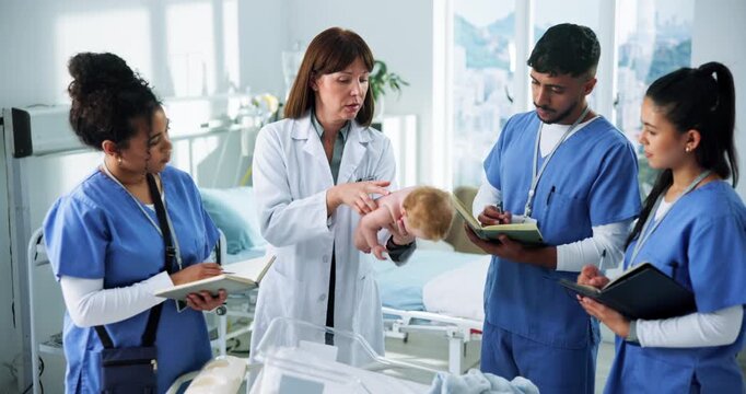 People, baby doll and students with demonstration, talking or writing with pediatrician. University, medical interns or tutorial with lesson, neonatal or dummy with healthcare education or notebook