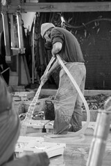 Fishermen cleaning the fish in the boat in the port of Santa Pola town