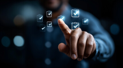 Fototapeta premium Faceless man's finger touching digital interface with checkmarks heavily defocused background anonymous hand with clipboard icons representing tasks completion visualization pro