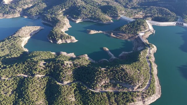 Cinematic Aerial 4K: Sweeping Wide-Angle Sunset Over Guadalhorce Lake, Pine Forests, and the Dramatic Caminito del Rey Gorge in Andalusia