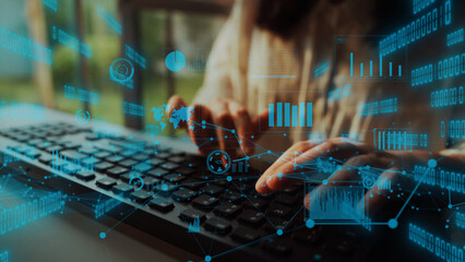 A woman types on a keyboard surrounded by digital data overlays, symbolizing the intersection of technology, analysis, and modern communication in a dynamic workspace. Xenic