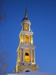 An ancient bell tower with night lighting