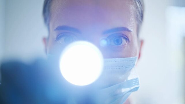 Pov video masked physician completing patient examination modern clinic hospital