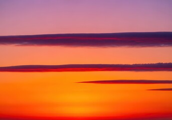 Fototapeta premium A magnificent, vibrant spectacle of the evening sky, displaying soft clouds illuminated by the setting sun's warm, intense glow, weather, golden hour, violet