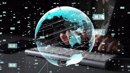 A digital globe overlaying data visualization on a keyboard and hands captures the essence of global connectivity and technology in a modern business setting. Xenic