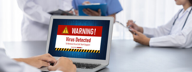 Virus warning alert on computer screen detected brisk cyber threat , hacker, computer virus and malware