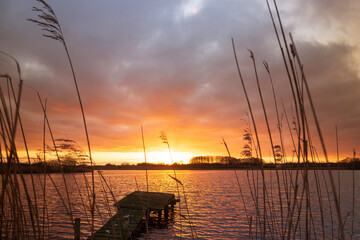 Jetty at the lake at sunset.