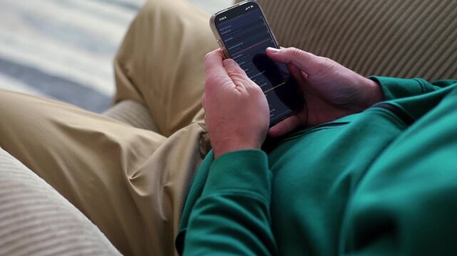 Middle Aged Man Receives an Attractive Remote Job Opportunity - SMS Text Scam to Credential Data Harvesting - Cybersecurity Education Concept