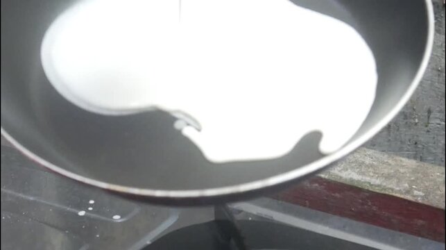 the process of making risol skin food in a Teflon pan made from wheat flour dough