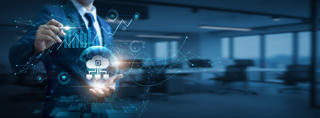 Fototapeta premium Businessman hand hold global Edge computing network and data, real time processing, low latency systems, distributed computing architecture, IoT technology