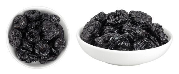 Prunes in ceramic bowl isolated on white background, heap of dried plums. Top view. Flat lay