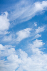 Vertical View of Cirrus Clouds in a Bright Blue Sky. High quality photo