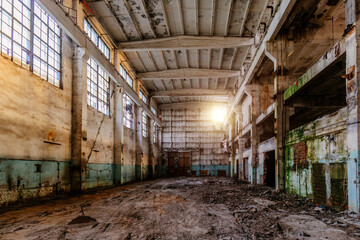 Large abandoned industrial hall interior