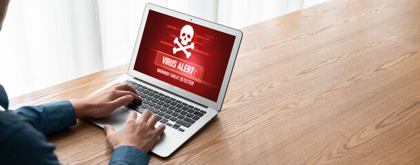 Virus warning alert on computer screen detected modish cyber threat , hacker, computer virus and malware