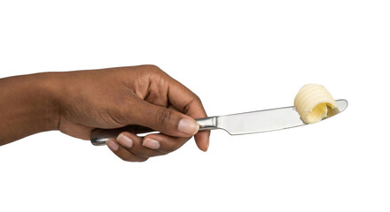 Hand holding butter on knife
