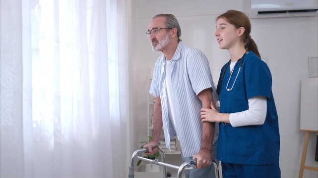 An elderly man and his doctor, standing by the window in the patient's room, talking and giving a preliminary examination