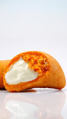 Pastry filled with chicken and creamy cheese, Brazilian snack