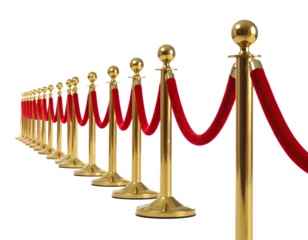 A line of golden stanchions with red velvet ropes on a black background