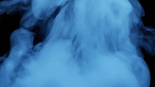 Ethereal blue mist swirling in darkness