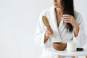 Quiet Setting Featuring Woman Using Organic Products To Care For Herself At Sunrise