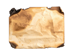 Burnt, crumpled sheet of paper on black background, featuring dark charring