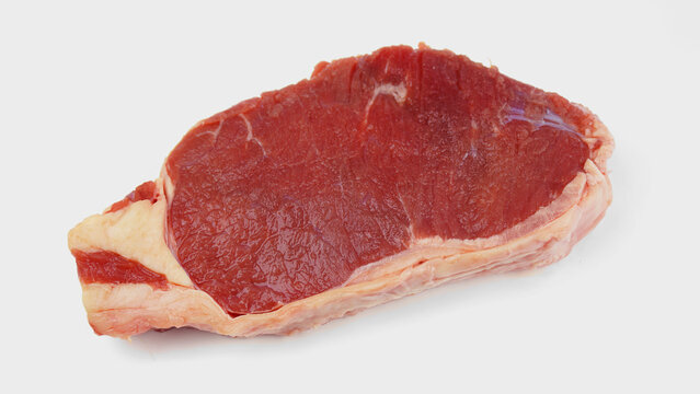 a raw and fresh sirloin steak, raw, uncooked, isolated on white background