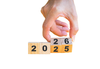 2026 New Year Transition Concept with Hand Turning Wooden Blocks Isolated