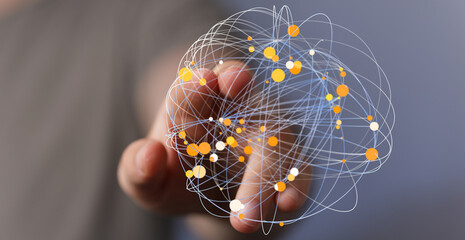 Person holding a sphere of connected lines and dots, symbolizing global networks, communication, and technological advancement. A vis