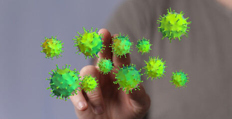 Close up of a hand touching digitally rendered coronavirus particles. Concept of virus spread and digital repr