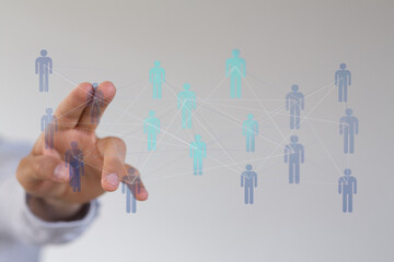 Networking hand pointing at a virtual human connections future concept communication and technology