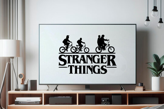 Stranger things logo with kids bicycling on television screen