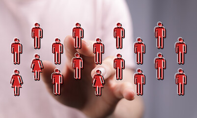 Hand pointing at human silhouettes symbolizing teamwork, leadership, unity, connection, or a virtual world interaction. Ideal for concepts like