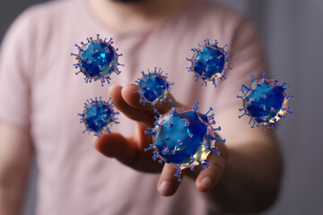 Image depicting a hand interacting with digital 3D virus cells. Medical and health concepts with visual metaph